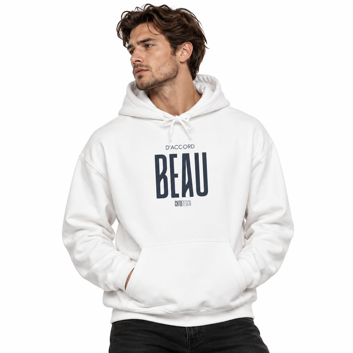 A man wearing a white pullover hoodie with a dark navy graphic print on the chest that reads 'D'ACCORD BEAU', photographed against a solid white background.