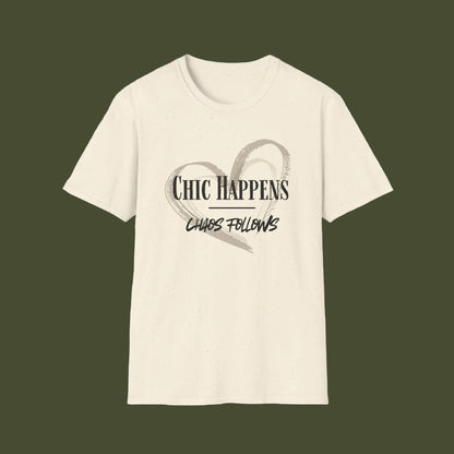 An off-white short-sleeve crewneck t-shirt with a graphic on the front featuring a distressed gray heart and the text 'CHIC HAPPENS' and 'CHAOS FOLLOWS'.