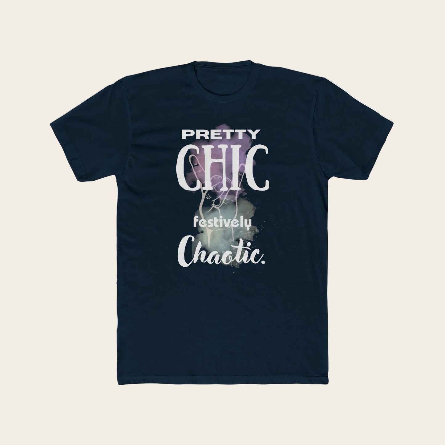 A navy blue short-sleeve t-shirt with a graphic print on the front that reads 'PRETTY CHIC festively Chaotic.' in white and light purple text over a smoky abstract background, displayed on a solid white background.