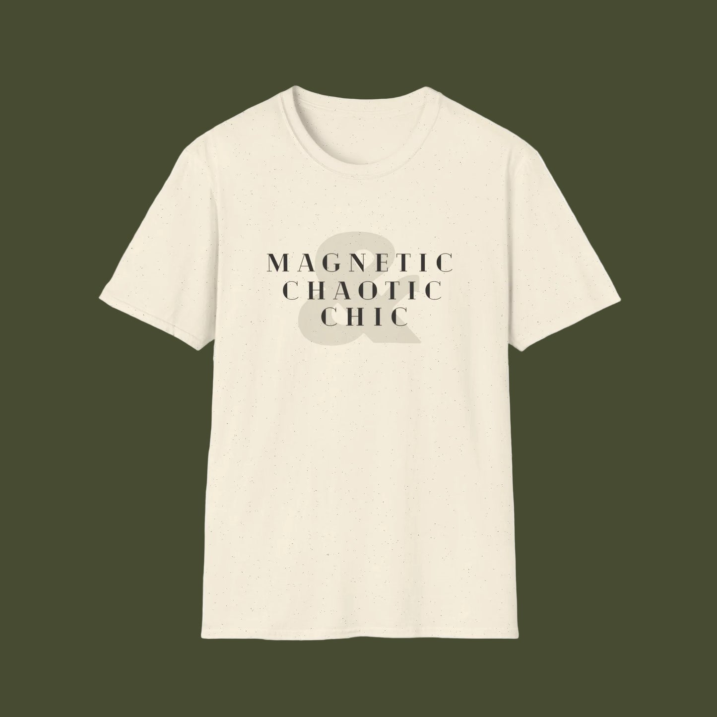 An off-white crewneck t-shirt with a graphic on the chest reading 'MAGNETIC CHAOTIC CHIC' in black text over a muted gray ampersand symbol.