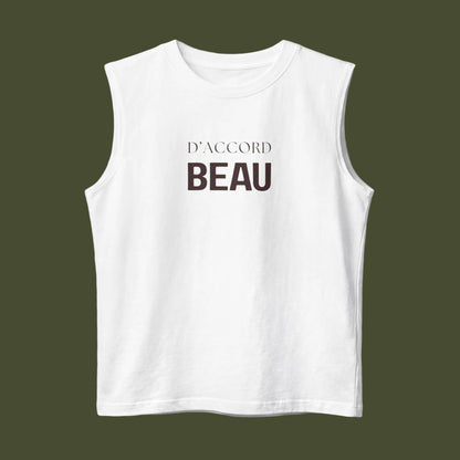 A white sleeveless crop top with the French phrase 'D'ACCORD BEAU' printed in dark brown on the chest, displayed against a clean white background.