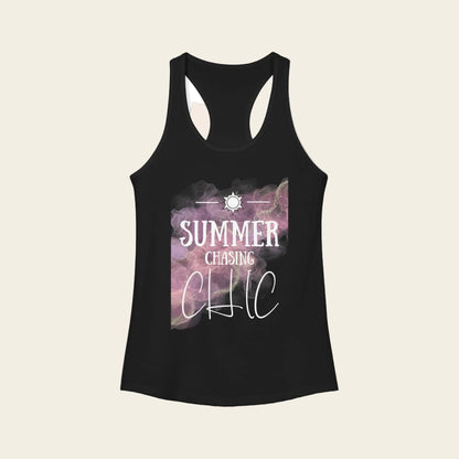 A black racerback tank top with a graphic print on the front featuring a purple and pink galaxy design with the text 'SUMMER CHASING CHIC' in white.