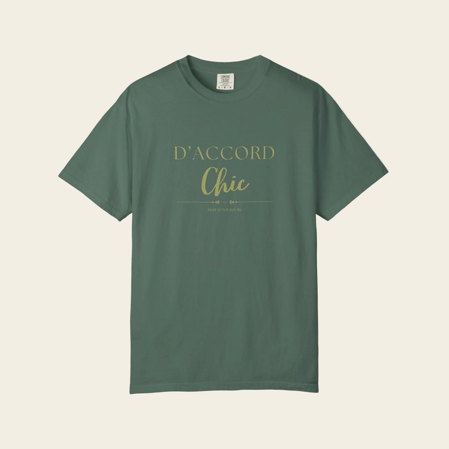 Green t-shirt with gold graphic design on a white background