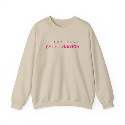 An beige crewneck sweatshirt featuring pink “PRIMADONNA BY CHTQ DESIGN” text across the chest, displayed against a clean white background.
