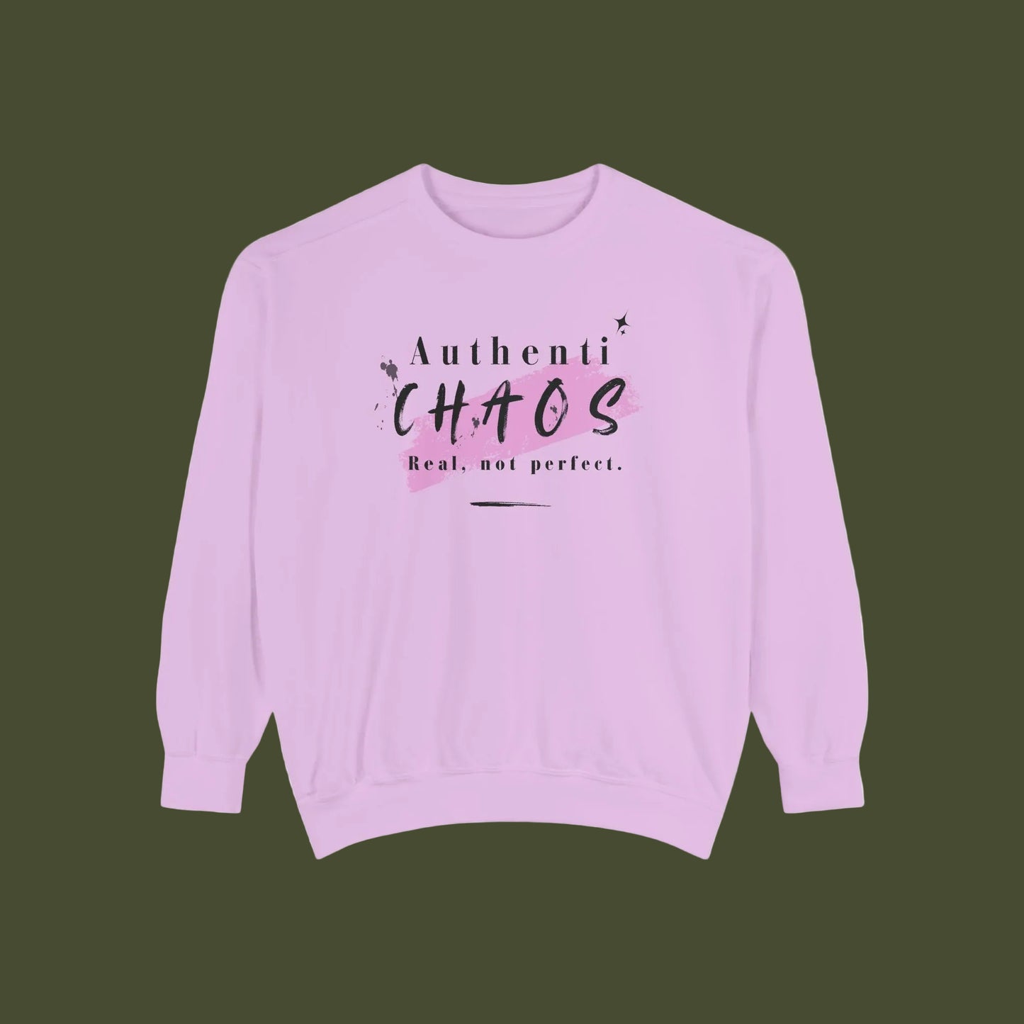 A light purple crewneck sweatshirt with a graphic on the chest that reads 'Authenti CHAOS Real, not perfect.' in black and pink lettering, displayed on a solid white background.