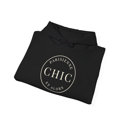 Folded black hoodie featuring a cream circular “PARISIENNE CHIC ET ALORS” graphic on the front, displayed against a clean white background.