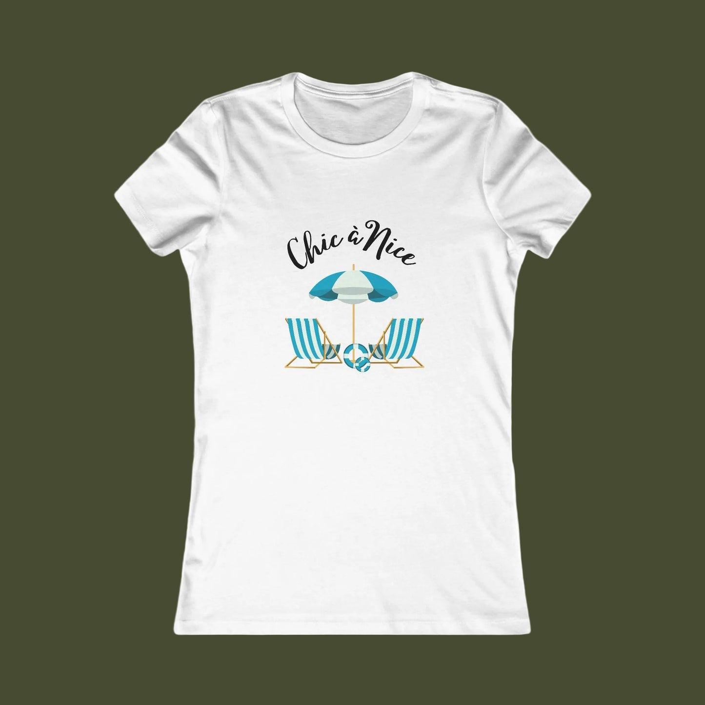 A white short-sleeve crewneck t-shirt with a graphic on the front showing a beach umbrella and two striped beach chairs under the text 'Chic a Nice'.