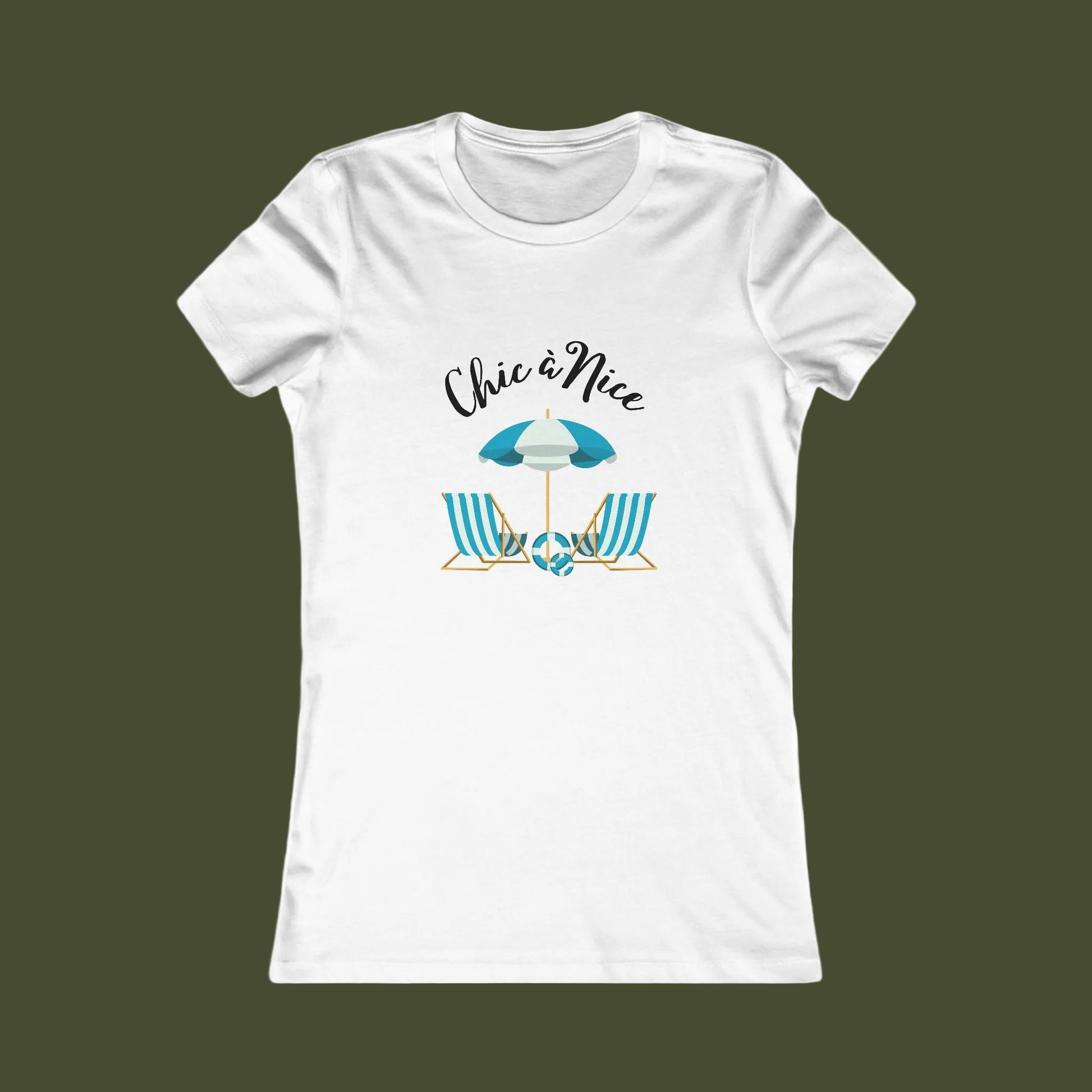 A white short-sleeve crewneck t-shirt with a graphic on the front showing a beach umbrella and two striped beach chairs under the text 'Chic a Nice'.