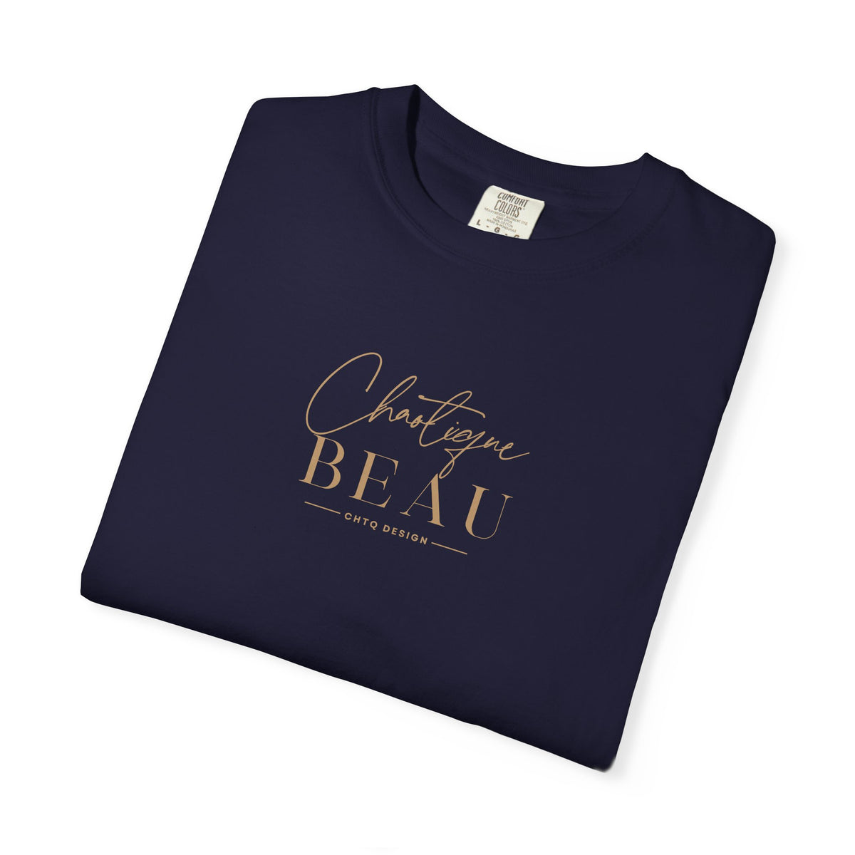 Folded navy Chaotique Beau CHTQ Design graphic T-shirt with a gold-toned front print, shown against a white background.