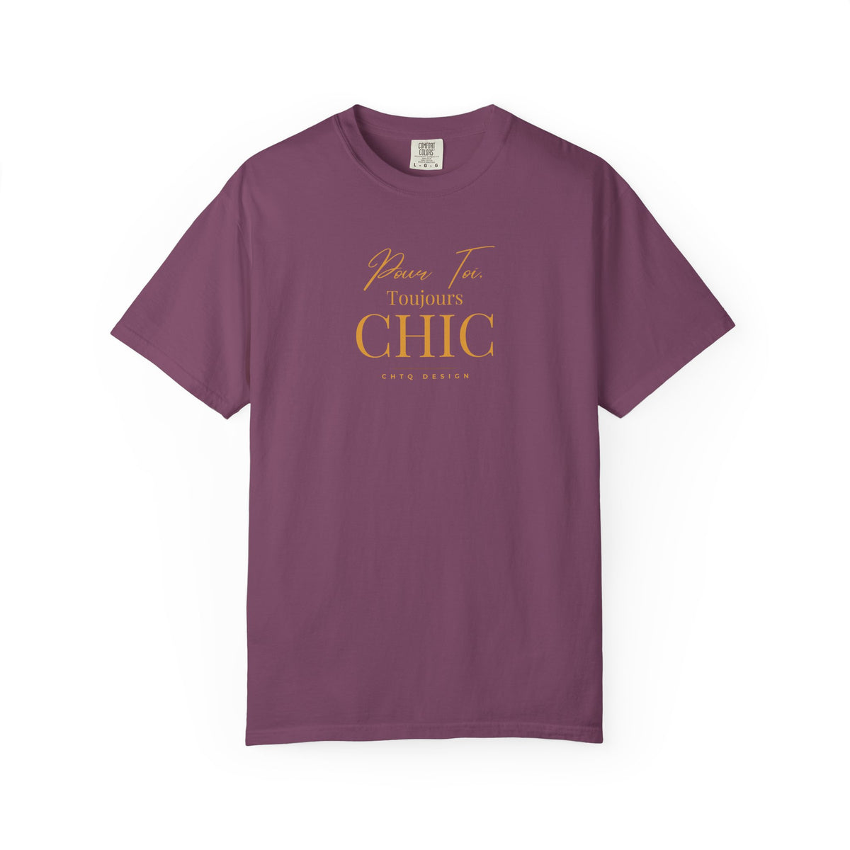 A purple CHTQ Design T-shirt with gold “Pour Toi. Toujours CHIC” typography on the front.