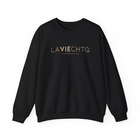 Black crewneck sweatshirt with “LA VIE CHTQ” and “BY CHTQ DESIGN” printed in gold across the chest, displayed against a clean white background.