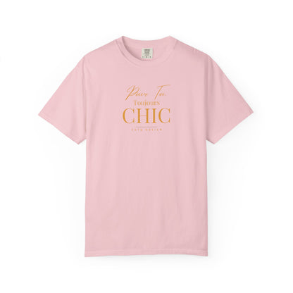 A pink CHTQ Design T-shirt with gold “Pour Toi. Toujours CHIC” typography on the front.