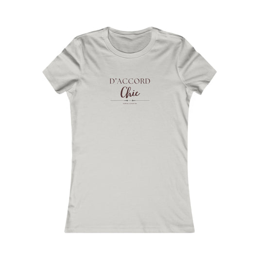 A light gray short-sleeve crewneck t-shirt with 'D'ACCORD Chic' printed in dark brown text on the chest, displayed on a clean white background.