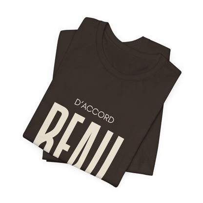 Folded D’ACCORD BEAU Graphic T-Shirt by CHTQ Design in dark chocolate brown with oversized cream BEAU typography and minimalist French-inspired design.