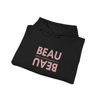 A folded black BEAU graphic hoodie with a mirrored dusty pink BEAU print and CHTQ Design detail on the chest, displayed against a white background.