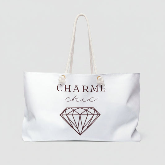 White weekender bag with graphic and text 'charme chic' 