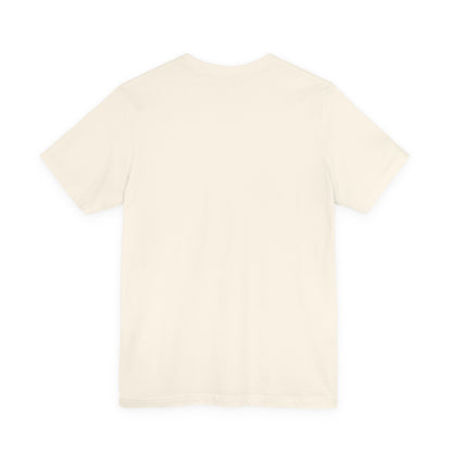 A plain cream-colored short-sleeve t-shirt shown from the back, laid flat against a solid white background.