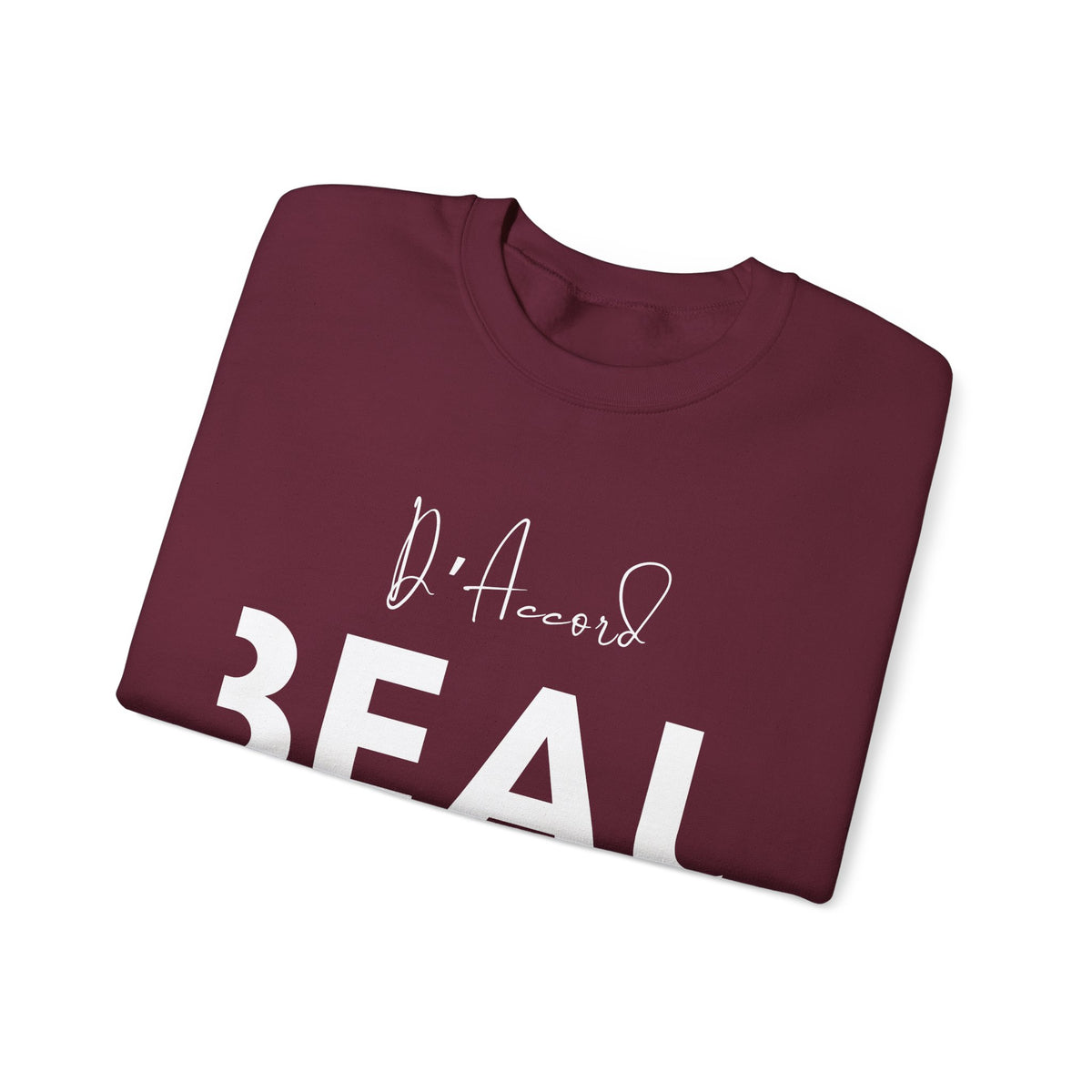 Folded maroon BEAU D’ACCORD graphic crewneck sweatshirt with white handwritten and bold lettering on the front.