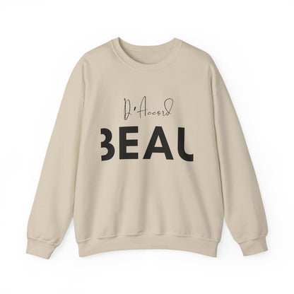 Sand BEAU D’ACCORD graphic crewneck sweatshirt with black handwritten and bold lettering on the front.