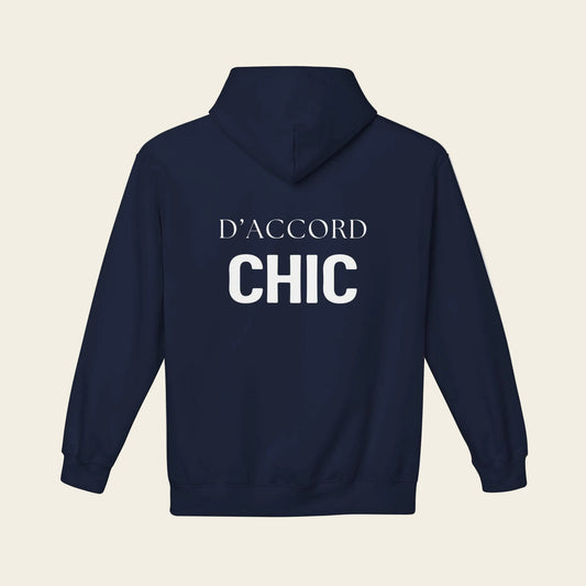 Navy blue D’Accord Chic pullover hoodie with white back typography, displayed against a white background.
