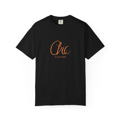 A black short-sleeve T-shirt featuring a orange “Chic D’Accord” graphic on the chest, displayed against a clean white background.