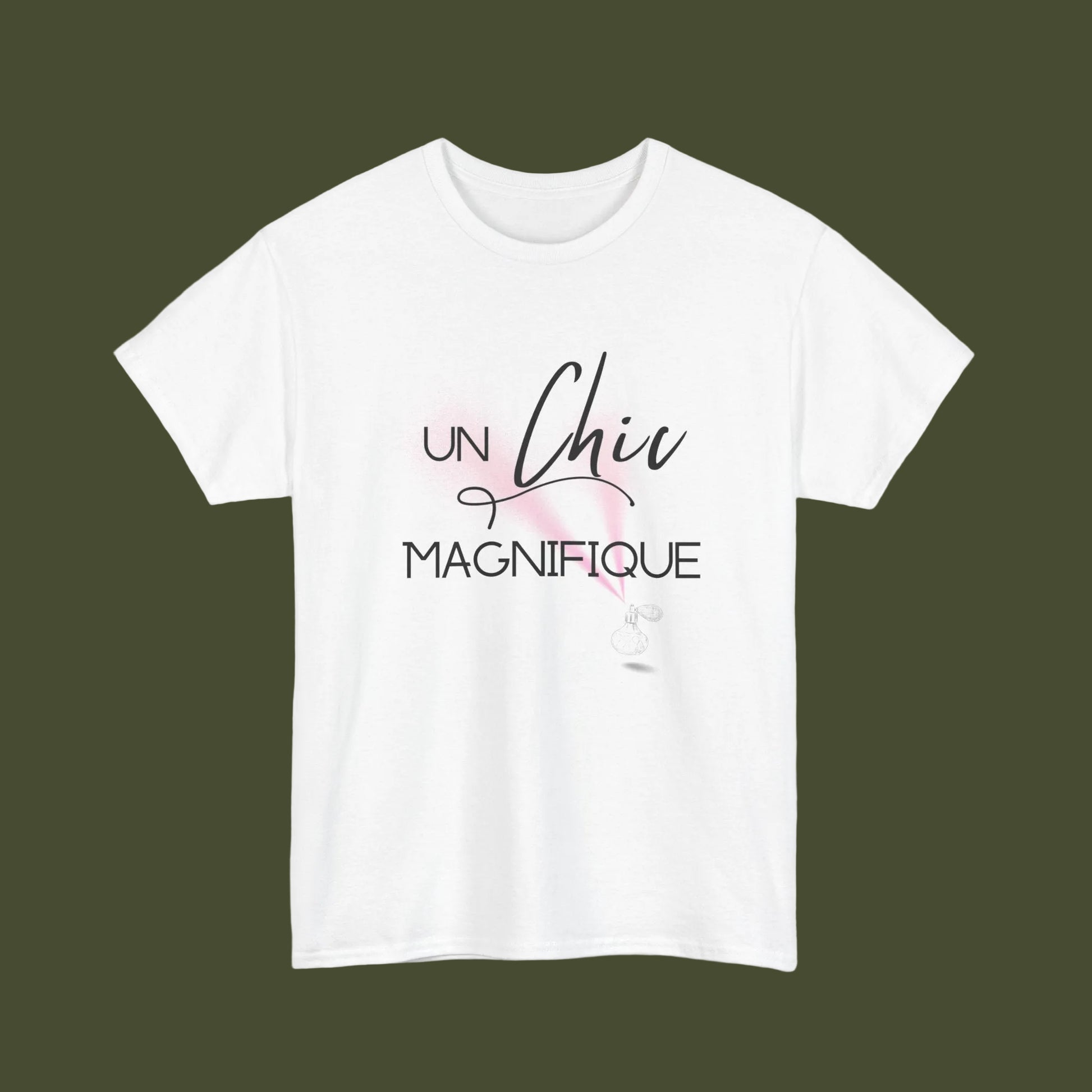 A white short-sleeve crewneck t-shirt featuring a French graphic print that reads 'UN Chic MAGNIFIQUE' in black script and block lettering, accented with a soft pink watercolor splash and a small white feather illustration.