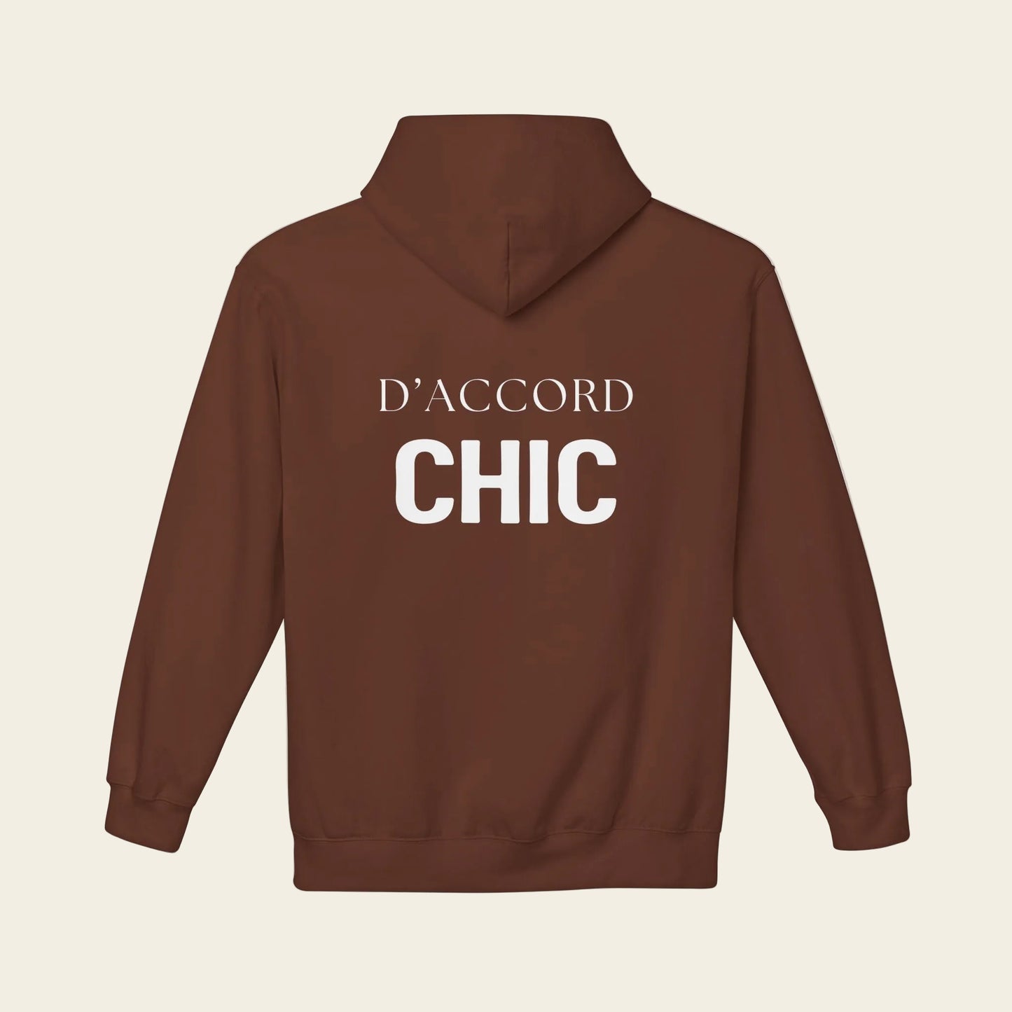 A brown pullover hoodie shown from the back, featuring the words 'D'ACCORD CHIC' printed in white across the upper back.