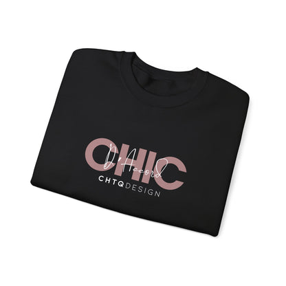 A folded CHIC D’Accord CHTQ Design black crewneck sweatshirt with dusty rose graphic