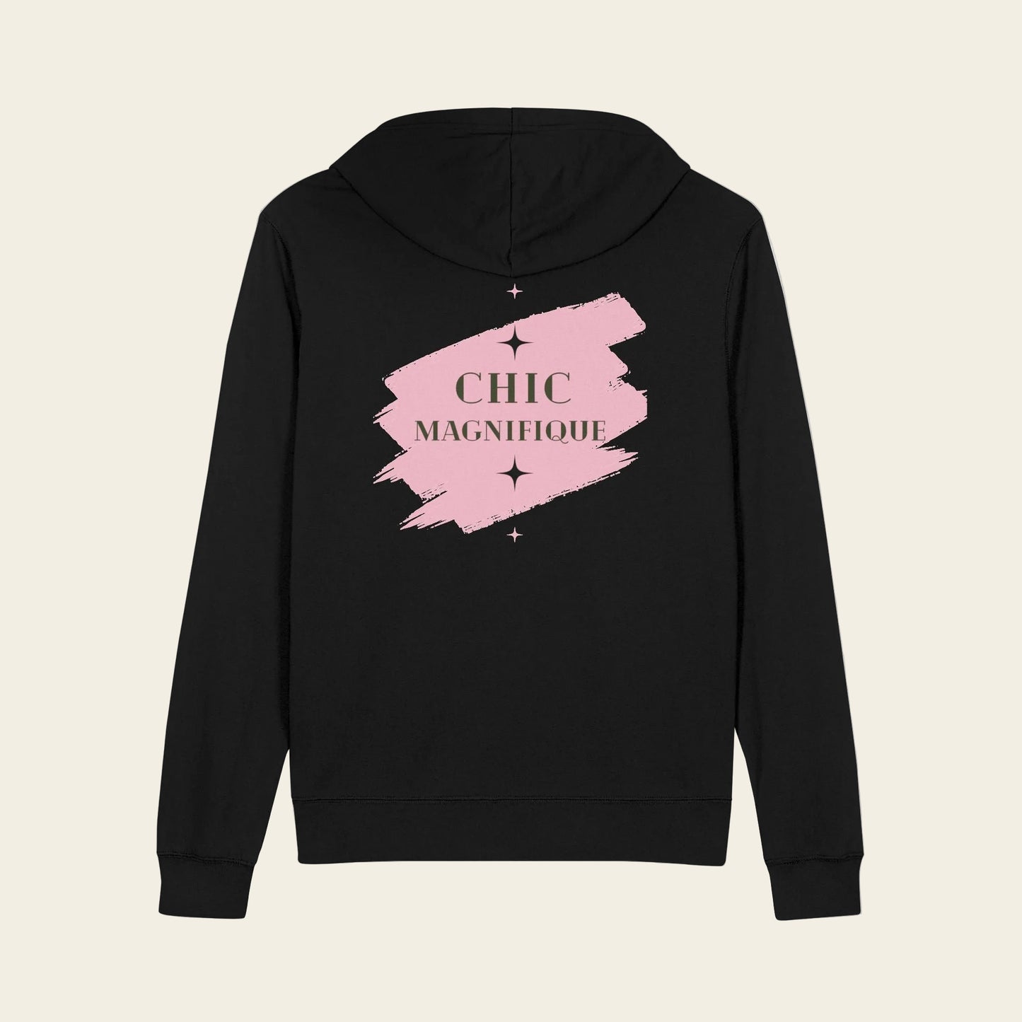 A black zip-up hoodie shown from the back, featuring a pink paint-stroke graphic with the words 'CHIC MAGNIFIQUE' in a gold serif font and small star accents.