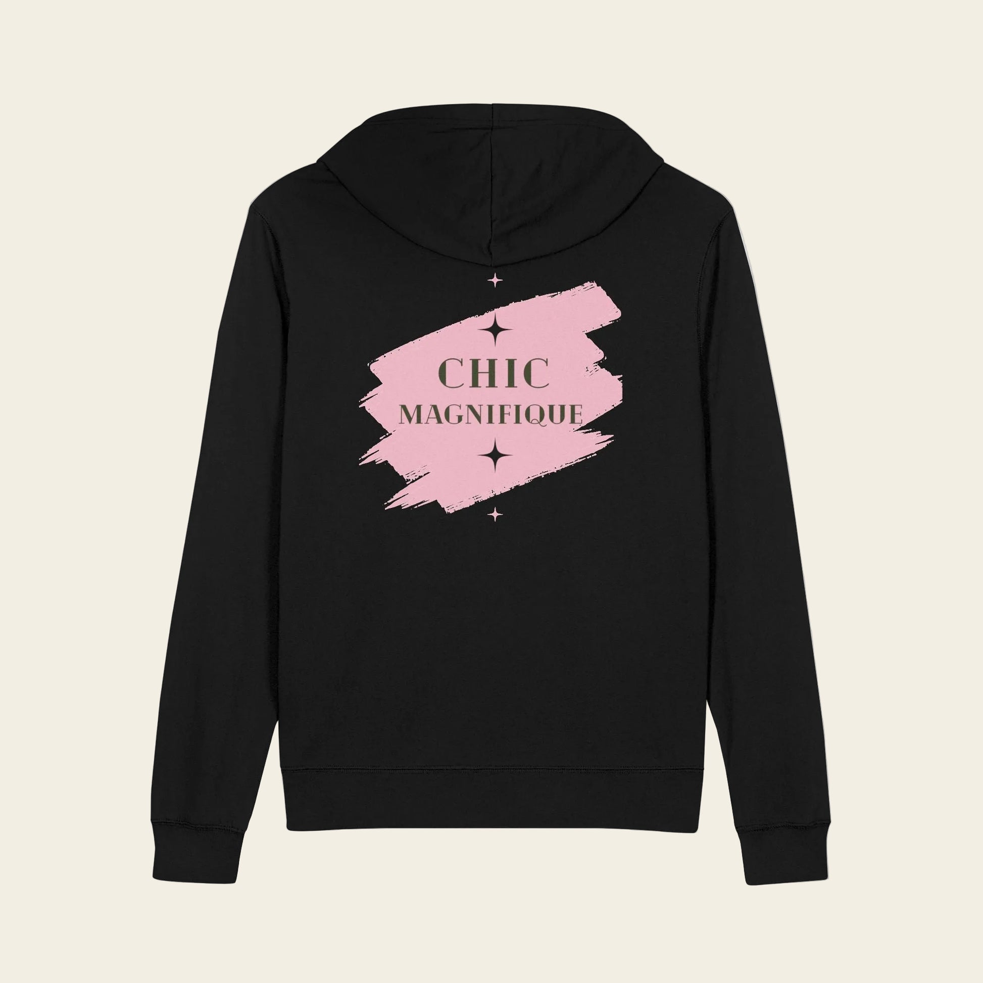 A black zip-up hoodie shown from the back, featuring a pink paint-stroke graphic with the words 'CHIC MAGNIFIQUE' in a gold serif font and small star accents.