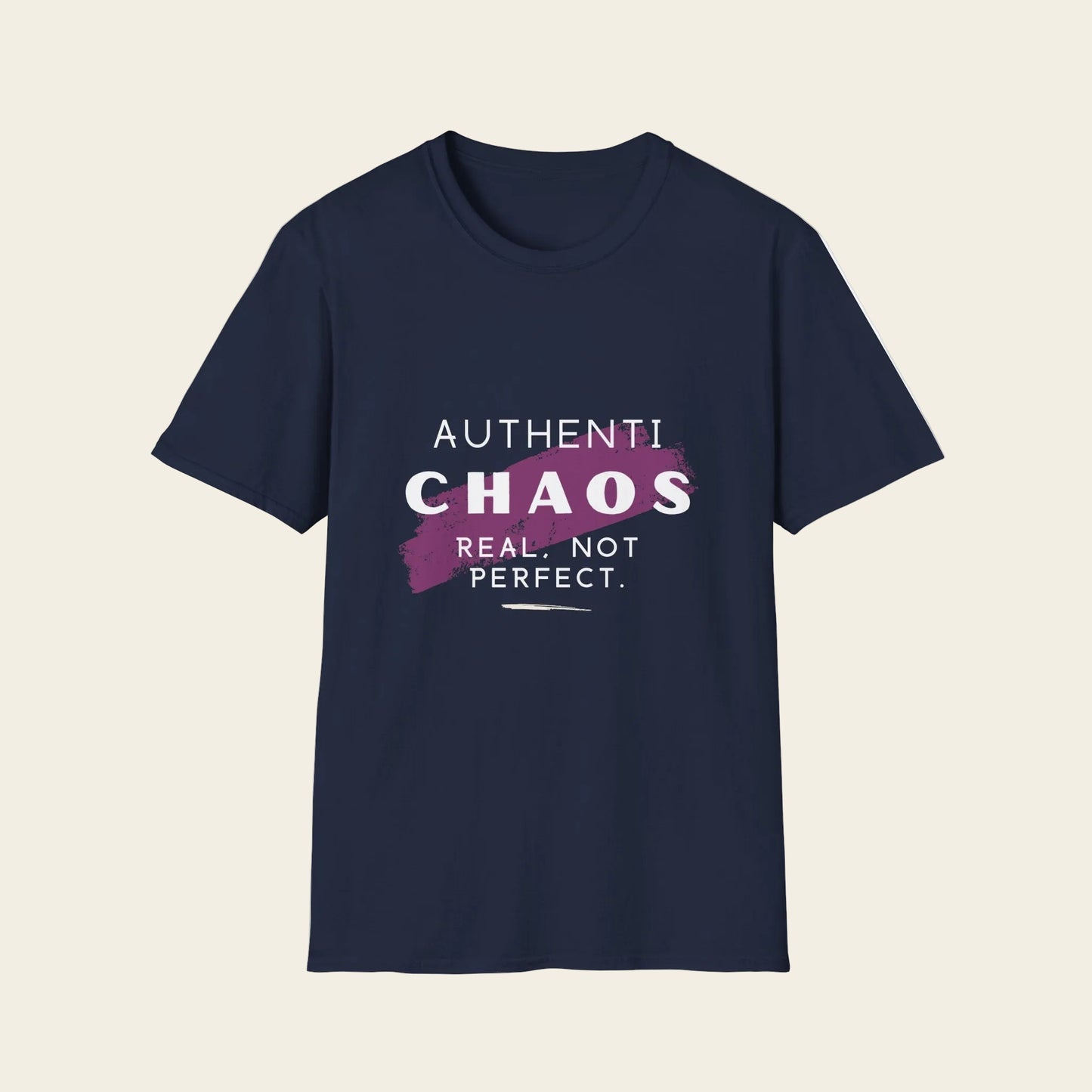 A black short-sleeve crewneck t-shirt with a graphic on the chest that reads 'AUTHENTICHAOS REAL, NOT PERFECT.' in white and purple text over a purple paint-splatter shape.