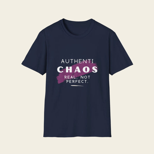 A black short-sleeve crewneck t-shirt with a graphic on the chest that reads 'AUTHENTICHAOS REAL, NOT PERFECT.' in white and purple text over a purple paint-splatter shape.