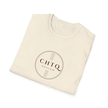 A folded light beige cotton t-shirt with a circular logo printed in a muted plum-brown color on the front, reading 'CHTQ DESIGN'. The t-shirt is photographed at an angle on a clean white background with a soft drop shadow.