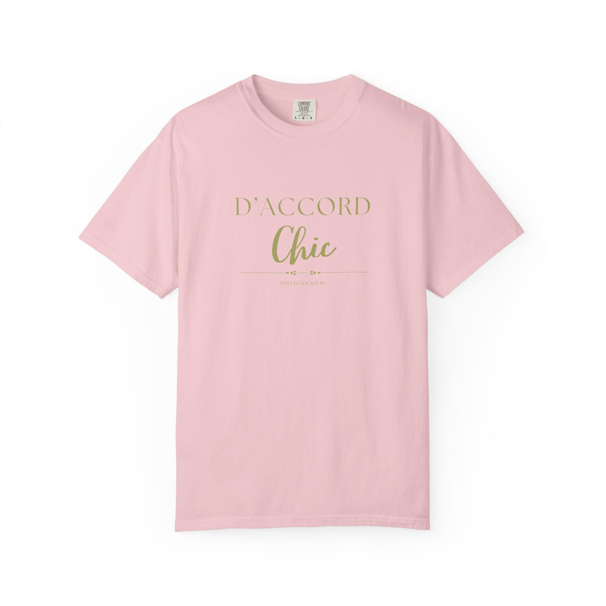 A light pink short-sleeve crewneck t-shirt with 'D'ACCORD Chic' printed in gold on the chest, displayed on a clean white background.