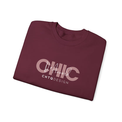 A folded CHIC D’Accord CHTQ Design maroon crewneck sweatshirt with rose graphic