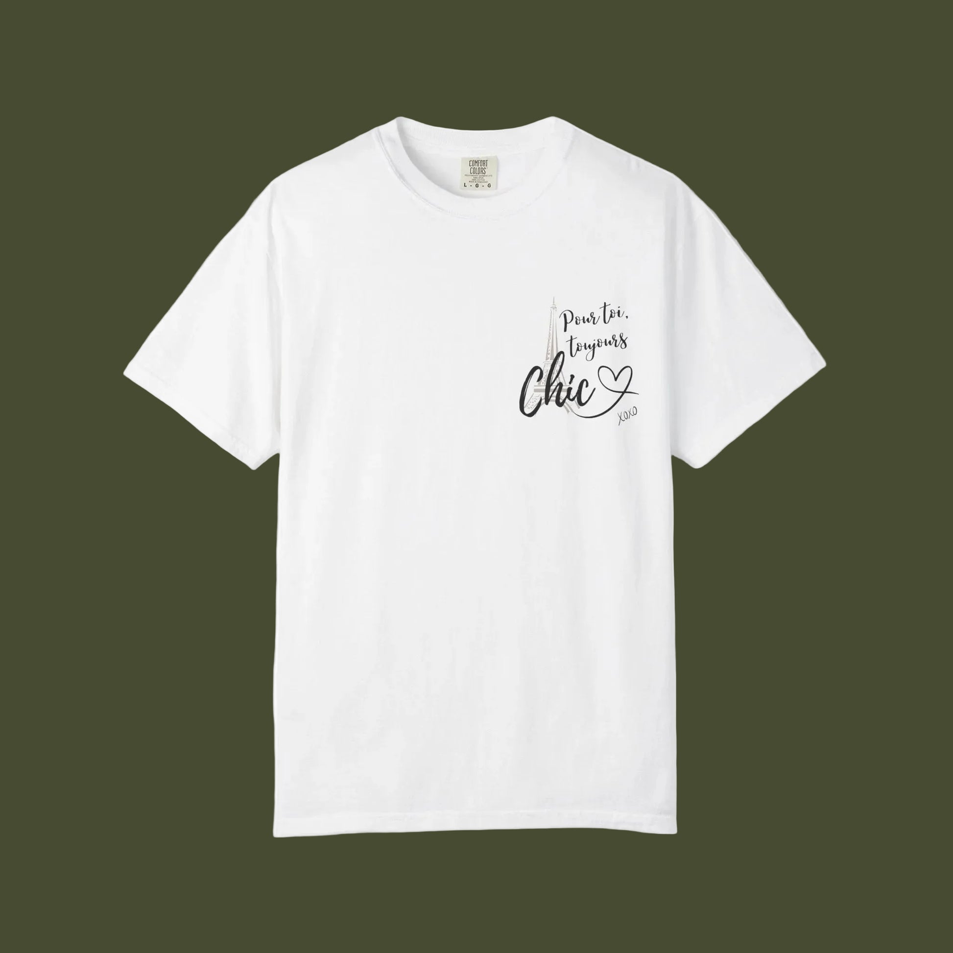 An off-white short-sleeve crewneck t-shirt with a small graphic on the left chest that reads 'pour toi toujours Chic' in black and gray lettering with a small heart below, displayed on a clean white background.