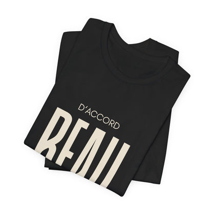 Folded D’ACCORD BEAU Graphic T-Shirt by CHTQ Design in black with oversized cream BEAU typography and French-inspired lettering on the front.