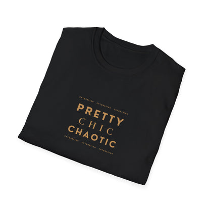 A folded black short-sleeve graphic T-shirt with 'Pretty Chic Chaotic' printed in gold on the front, displayed against a plain white background.