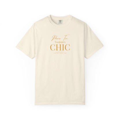 Cream color CHTQ Design T-shirt with gold “Pour Toi. Toujours CHIC” typography on the front.