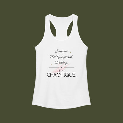 A white racerback tank top with a black typographic graphic on the front reading 'Embrace The Unexpected, Darling. STAY CHAOTIQUE.