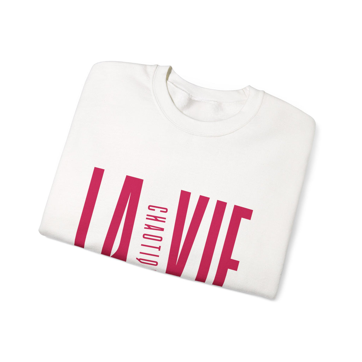 Folded white LA VIE CHAOTIQUE sweatshirt showing magenta graphic print