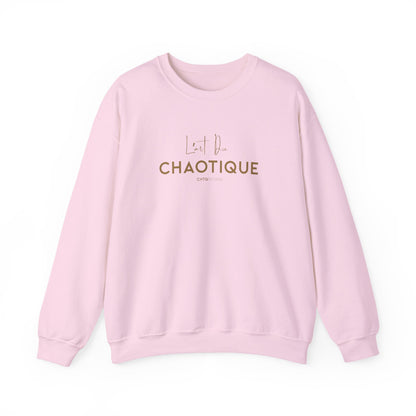 Light pink L’ART DU CHAOTIQUE crewneck sweatshirt with golden minimalist front typography, displayed against a clean white background.