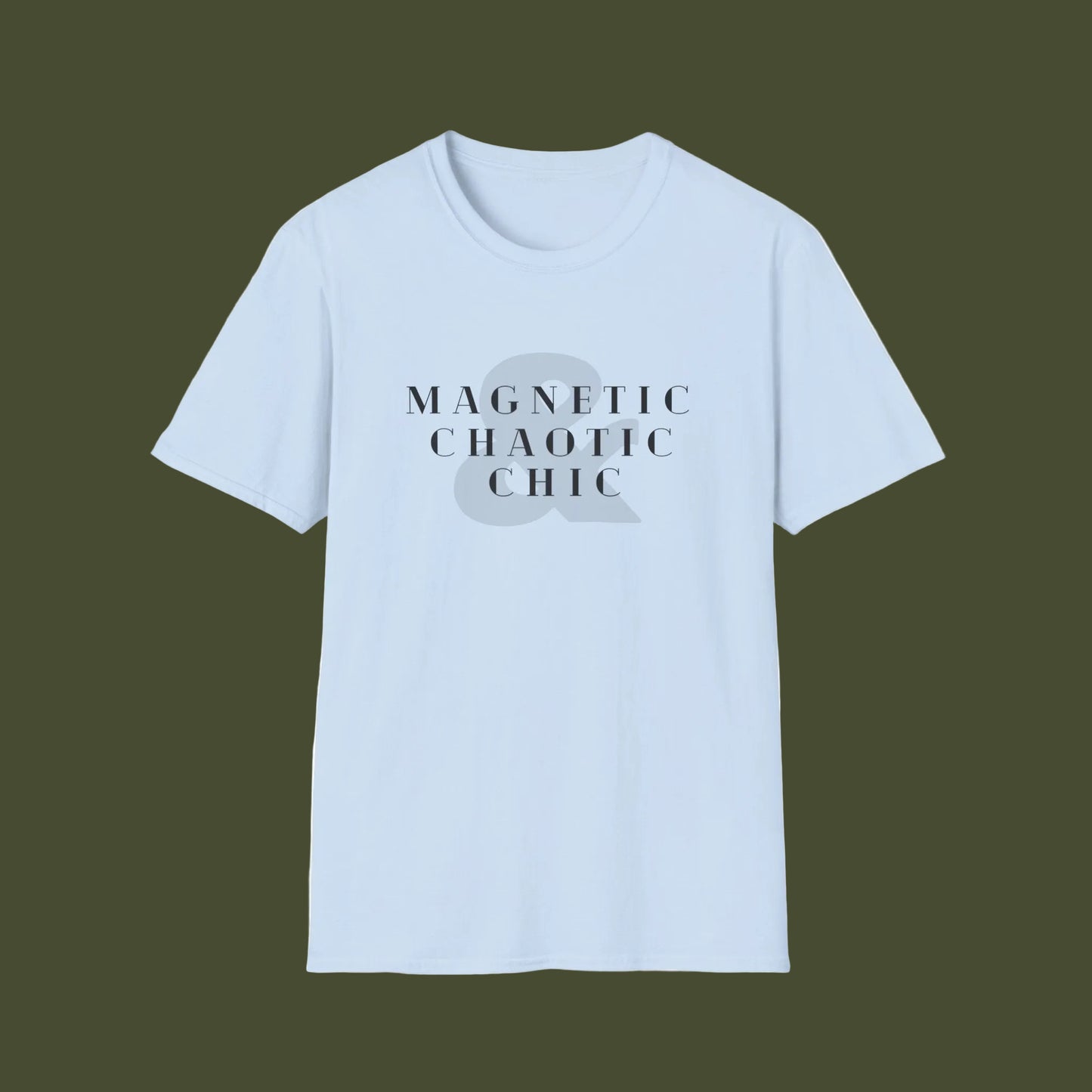 A light blue short-sleeve crewneck t-shirt with the text 'Magnetic chaotic chic' printed in black on the chest, displayed on a clean white background.