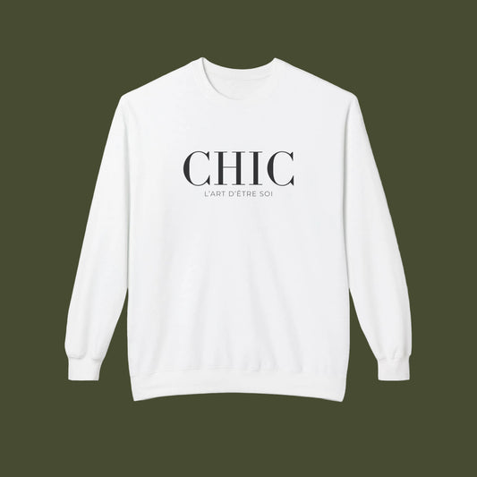 A white crewneck sweatshirt with 'CHIC' printed in black serif font and 'L'ART D'ETRE SOI' in smaller text below, displayed on a clean white background.