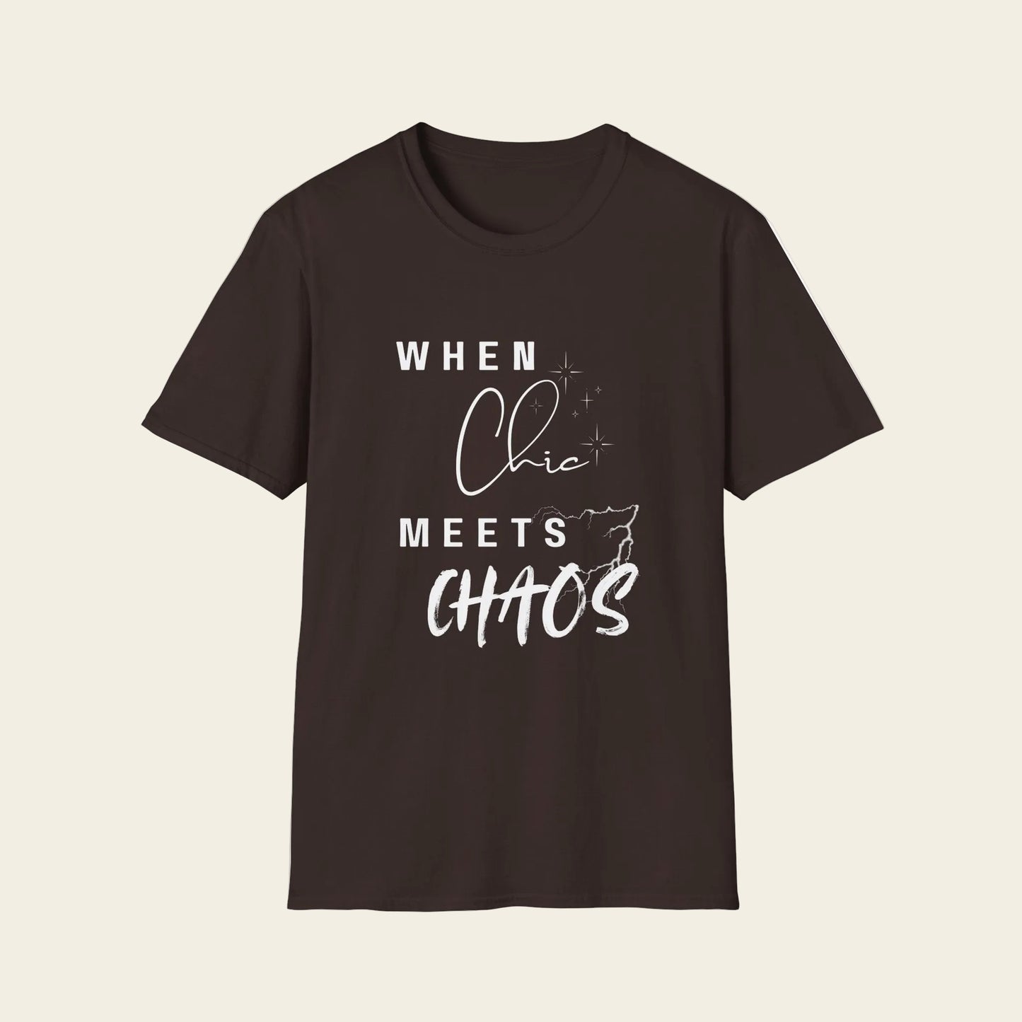A dark brown short-sleeve crewneck t-shirt with a white graphic text print that reads 'WHEN Chic MEETS CHAOS' on the front, displayed against background.