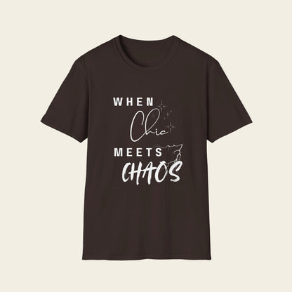 A dark brown short-sleeve crewneck t-shirt with a white graphic text print that reads 'WHEN Chic MEETS CHAOS' on the front, displayed against background.