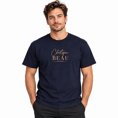 Male model wearing a navy Chaotique Beau CHTQ Design graphic T-shirt with a gold-toned front print, photographed against a white studio background.