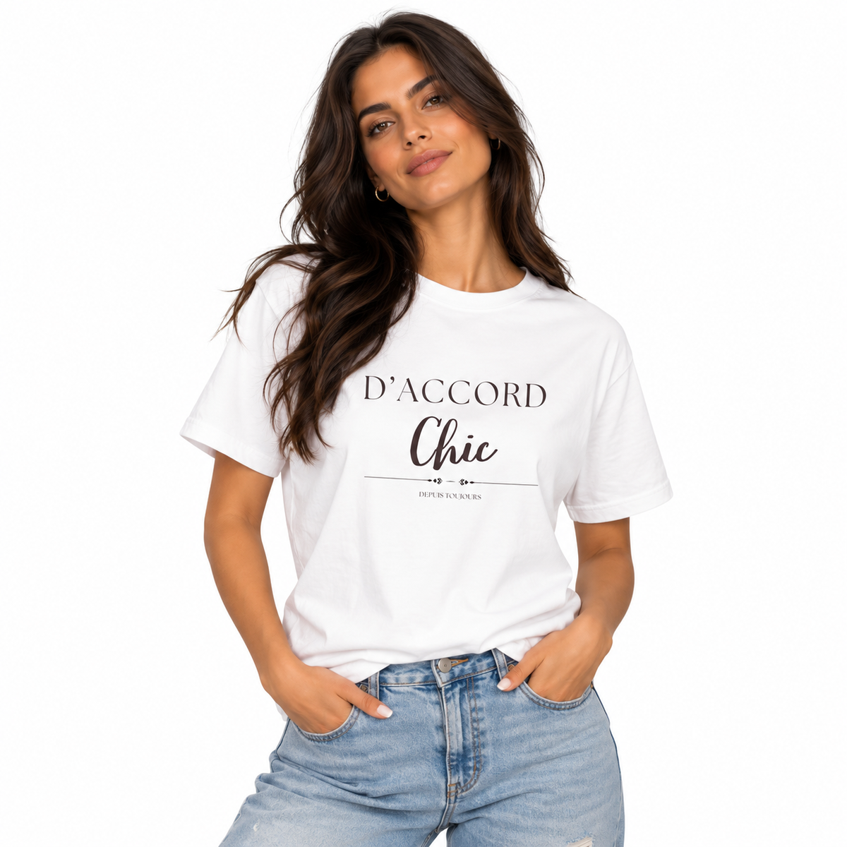A woman wearing a white graphic t-shirt with the text 'D'ACCORD Chic' printed in black, paired with light-wash blue jeans, against a plain white background.