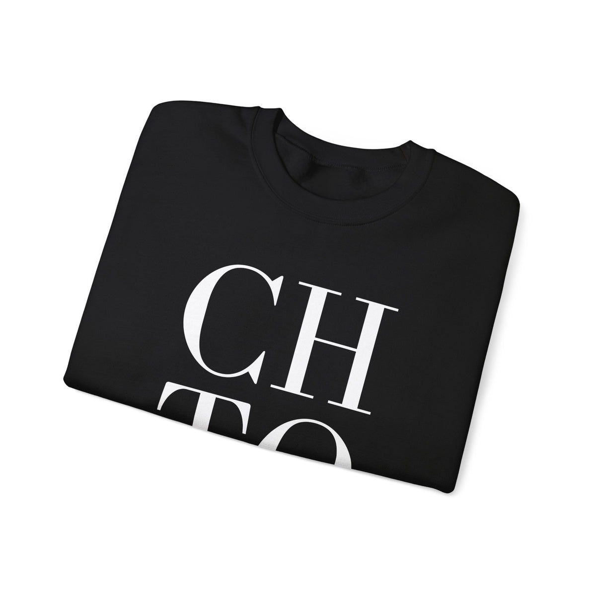 A folded black crewneck sweatshirt from back featuring a graphic print on the front with the text 'CHTQ REFINED ELEGANCE' in white over a muted gold city skyline silhouette, displayed against a neutral gray background.