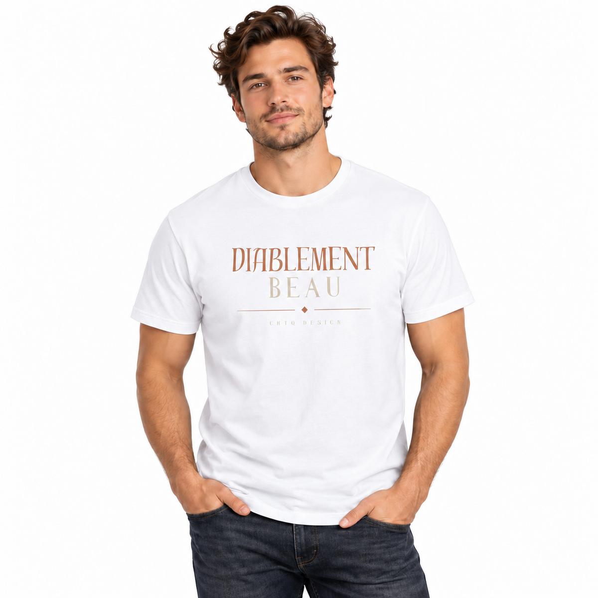 A man wearing a white crewneck t-shirt with 'DIABLEMENT BEAU' printed in brown on the chest, paired with light beige pants, against a plain white background.